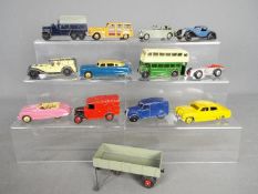 Dinky Toys - A fleet of 13 unboxed diecast vehicles by Dinky Toys.