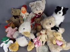 A collection of unboxed vintage dolls and mainly soft toys. All items are in Playworn condition.
