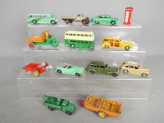 Dinky Toys - A collection of 13 unboxed diecast vehicles and accessories by Dinky Toys.