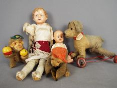 Kader, Others - A collection of five unboxed vintage dolls and soft toys.