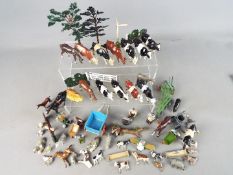 Britains - Over 60 unboxed figures, farm animals and accessories from the Britains Farm Series.