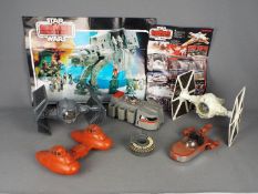 Kenner, General Mills, Star Wars - A collection of six vintage unboxed Star Wars vehicles,