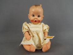 Gerber Doll - A Gerber baby doll marked to the rear of the head 'Gerber Baby, Gerber Products Co.