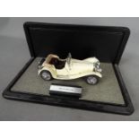 Franklin Mint - A boxed 1:24 scale Jaguar SS by Franklin Mint.