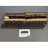 Bassett Lowke - Two boxes of Basset Lowke O Gauge curved three rail track,