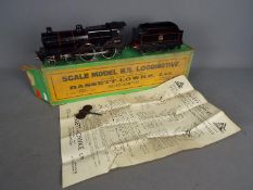 Bassett Lowke - A boxed O gauge Bassett Lowke #3312 clockwork 4-4-0 steam locomotive and tender Op.