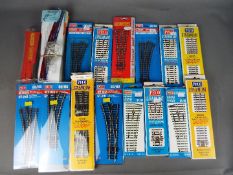 Peco, Hornby - 14 boxed / carded HO/OO track pieces, with 11 packs of OO and N gauge Tracksetta.