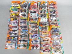 Matchbox - Approximately 50 boxed / blister carded modern issue Matchbox diecast vehicles.