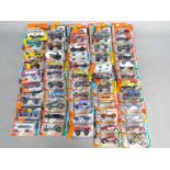 Matchbox - Approximately 50 boxed / blister carded modern issue Matchbox diecast vehicles.