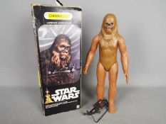Denys Fisher, Star wars - A boxed vintage Star Wars 12" poseable Chewbacca figure.