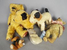 Chad Valley - A collection of predominately vintage soft toys, including bears and dogs.