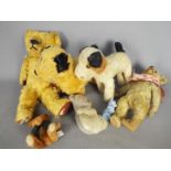 Chad Valley - A collection of predominately vintage soft toys, including bears and dogs.