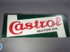 A cast iron advertising sign marked Castrol This lot must be paid for and removed no later than