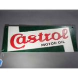 A cast iron advertising sign marked Castrol This lot must be paid for and removed no later than