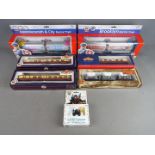 Bachmann - A collection of seven boxed HO and OO gauge model railway engines and rolling stock by