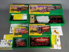 Corgi Classics - Four boxed diecast vehicles from the Corgi 'Showmans Range'.