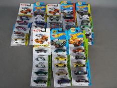 Hot Wheels - Approximately 40 carded Hot Wheels diecast vehicles on long cards from various ranges.