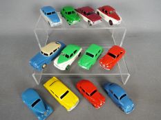 Dinky Toys - A collection of 12 repainted / restored diecast Dinky Toys.