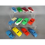 Dinky Toys - A collection of 12 repainted / restored diecast Dinky Toys.