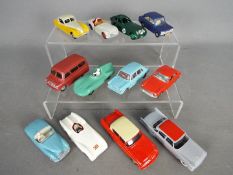 Dinky Toys, Corgi Toys - A collection of 12 repainted / restored diecast model vehicles.