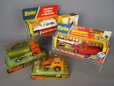 Dinky Toys - Five boxed diecast vehicles by Dinky Toys.