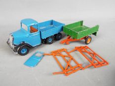 Britains - An unboxed Britains #1335 six wheeled army lorry finished in blue and black,