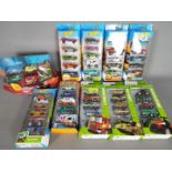 Disney Pixar, Corgi, Hot Wheels - A group of 10 boxed diecast sets / playsets.