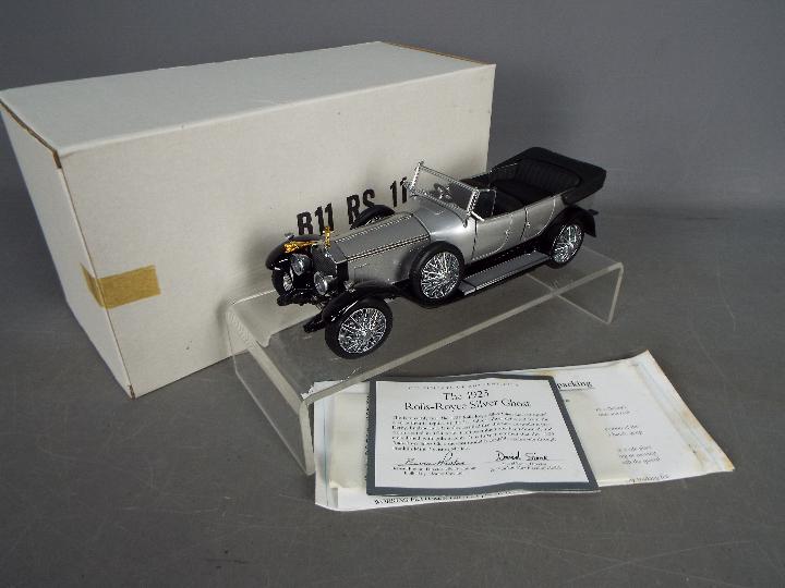 Franklin Mint - A boxed 1:24 scale 1925 Rolls Royce Silver Ghost by Franklin Mint.