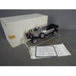 Franklin Mint - A boxed 1:24 scale 1925 Rolls Royce Silver Ghost by Franklin Mint.