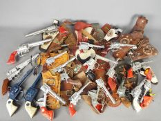 Lone Star, Crescent, Cap Guns - A cache of over 20 unboxed vintage toy cap guns,
