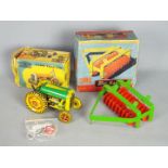 Mettoy Playthings - A boxed Mettoy Playthings Mechanical Farm Tractor #6435.