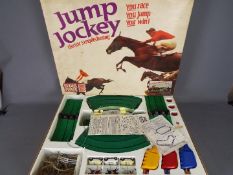 Triang - A boxed Triang JJ300 "Jump Jockey" Electric Steeplechase slot racing set.