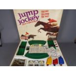 Triang - A boxed Triang JJ300 "Jump Jockey" Electric Steeplechase slot racing set.