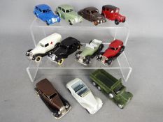 Dinky Toys - A collection of 11 repainted / restored diecast Dinky Toys.