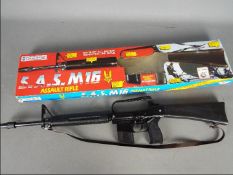 Lone Star, Cap Guns - A boxed Lone Star #1100 SAS M16 Assault Rifle 100 shot repeater cap rifle.