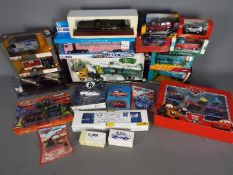 Disney Pixar, Corgi, Matchbox, Cararama - A group of boxed diecast vehicles in a variety of scales.