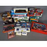 Disney Pixar, Corgi, Matchbox, Cararama - A group of boxed diecast vehicles in a variety of scales.