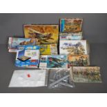 Revell, Dragon, Heller, Jo-Han - A collection of plastic model kits and figures in various scalese.