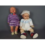 Hugo Wiegand, Kader - Two German made dolls.