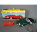 Lincoln International - a E type Jaguar remote control car by Lincoln International with original