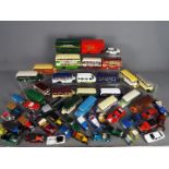 Corgi, Matchbox, Gama, Others - Over 40 unboxed diecast model vehicles in various scales.