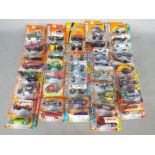 Matchbox - Approximately 40 blister carded modern issue Matchbox diecast vehicles.