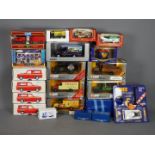 Corgi, Matchbox, Others - A fleet of 19 boxed diecast vehicles in various scales.