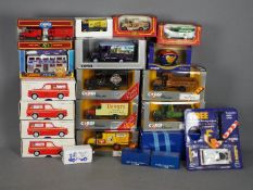 Corgi, Matchbox, Others - A fleet of 19 boxed diecast vehicles in various scales.