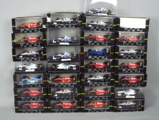 Onyx - 29 boxed diecast F1 racing car models by Onyx.