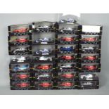 Onyx - 29 boxed diecast F1 racing car models by Onyx.