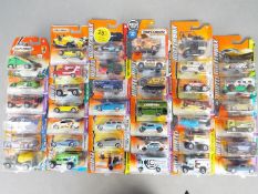 Matchbox - Approximately 40 modern issue Matchbox vehicles in blister cards / packs.