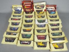 Matchbox Models of Yesteryear - Over 30 boxed Matchbox MOY presented in straw boxes.
