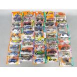 Matchbox - Approximately 40 blister carded modern issue Matchbox diecast vehicles.