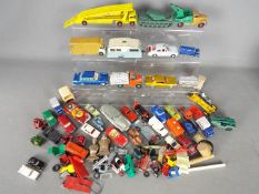 Dinky Toys, Matchbox, Lego - An unboxed group of diecast and plastic vehicles in various scales.